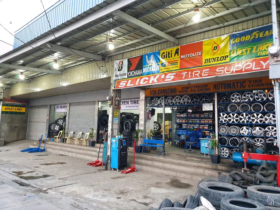 The front of Slick's Tire Supply on Doña Remedios Trinidad Highway, Baliuag